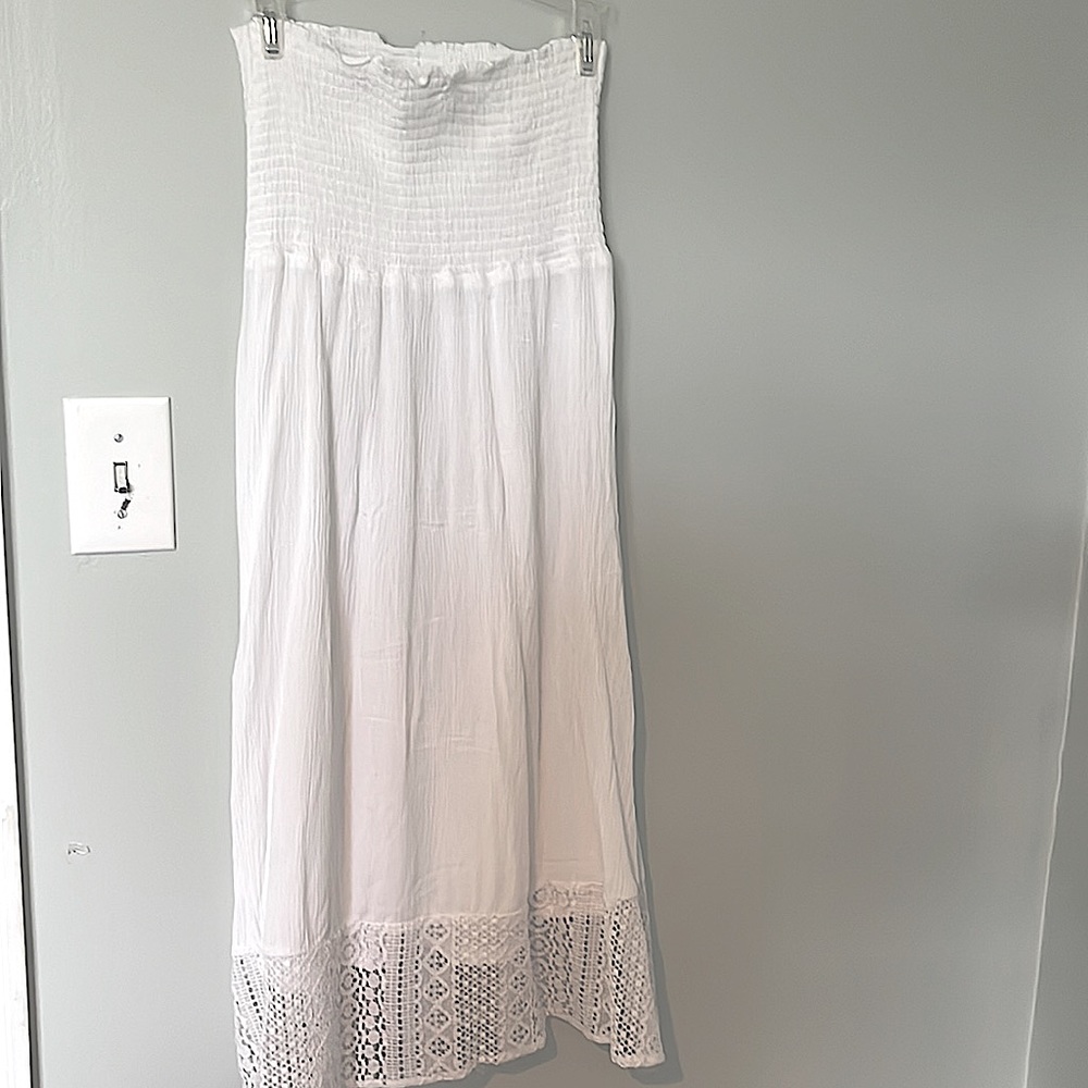 Strapless dress, perfect for church, never have been worn.